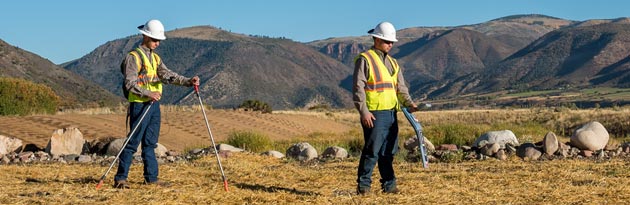 pipeline inspection done by two men